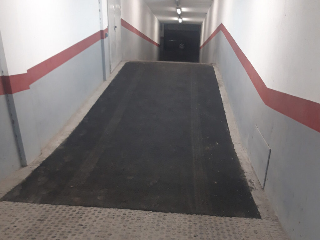 Pavimentació asfàltica - Rampa d'accès parking